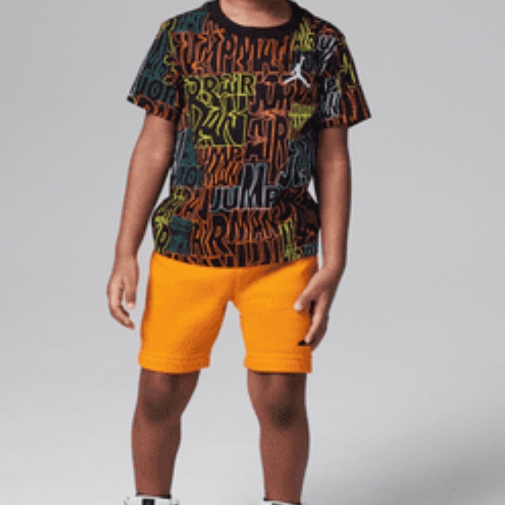 Nike Black Graphic Tee with Neon Accents & Orange Shorts